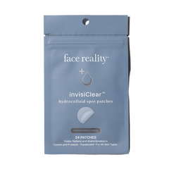 Blue package of face reality invisiclear hydrocolloid spot patches on a light gray background